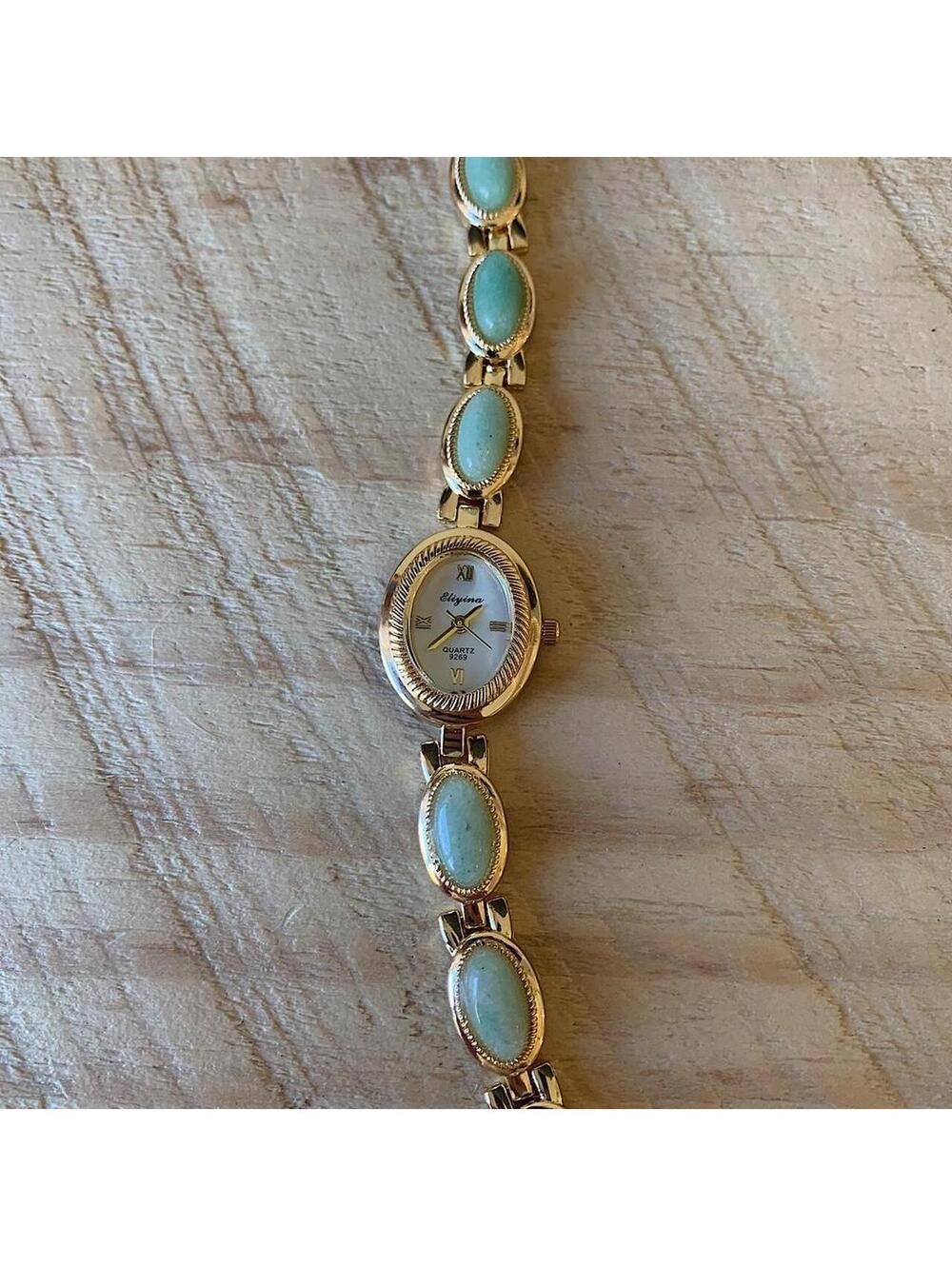 Dainty Gold watch with light blue jade stone opal accents. Item works tell time - Picture 3 of 8